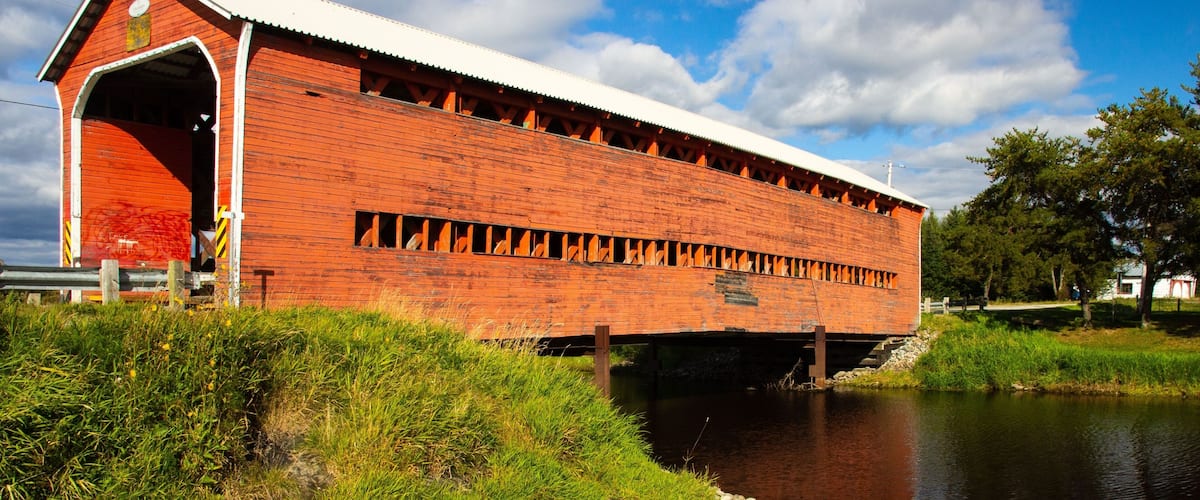 Vertical shot of orange covered Champagne Bridge, near Val-d'Or, Abitibi-Temiscamingue, Quebec