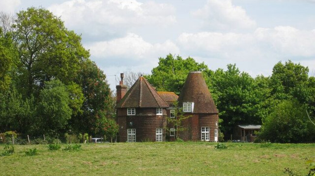 Oast House at Pekes, Nash Street, Golden Cross, East Sussex Twin round kiln oast house, one kiln now has an eight sided roof, the other missing its cowl. Keywords: roundel, converted, flat roof dormer, tile hanging, chimney, cowl-less
