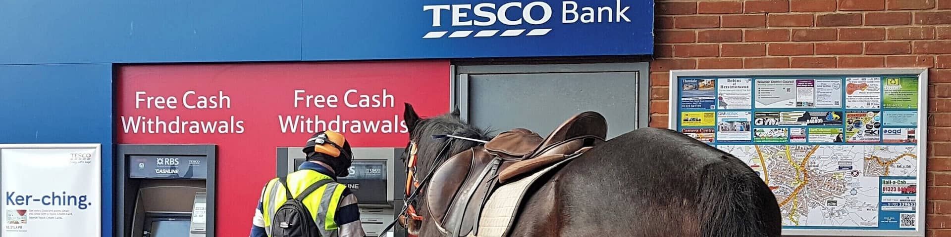 Not a sight you see every day and I wouldn't usually post a photo of a person at a cashpoint machine!
However, this guy in Hailsham, East Sussex just rode up on his horse, jumped off and got his cash. Looks like the horse knows his pin number now!