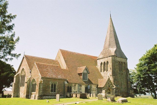 A church with a pointed steeple and a traditional architectural style.