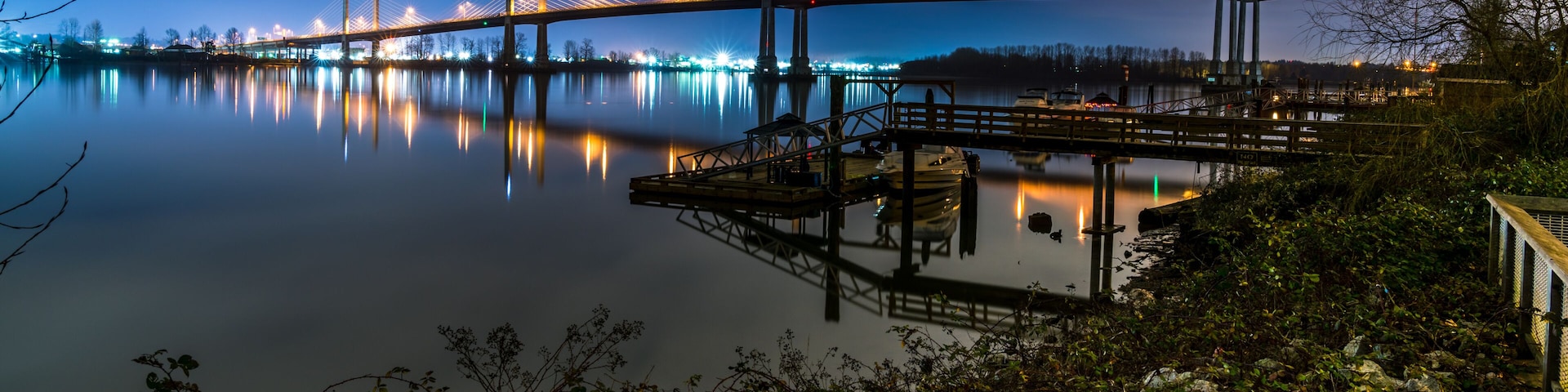 The Golden Ears Bridge, conecting Maple Ridge to Langley. Long exposure at night, reflecting into Fraser River.