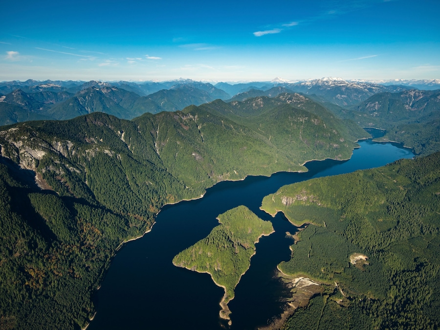 Stock aerial photo of the Coquitlam Lake Reservoir and mountains, Canada