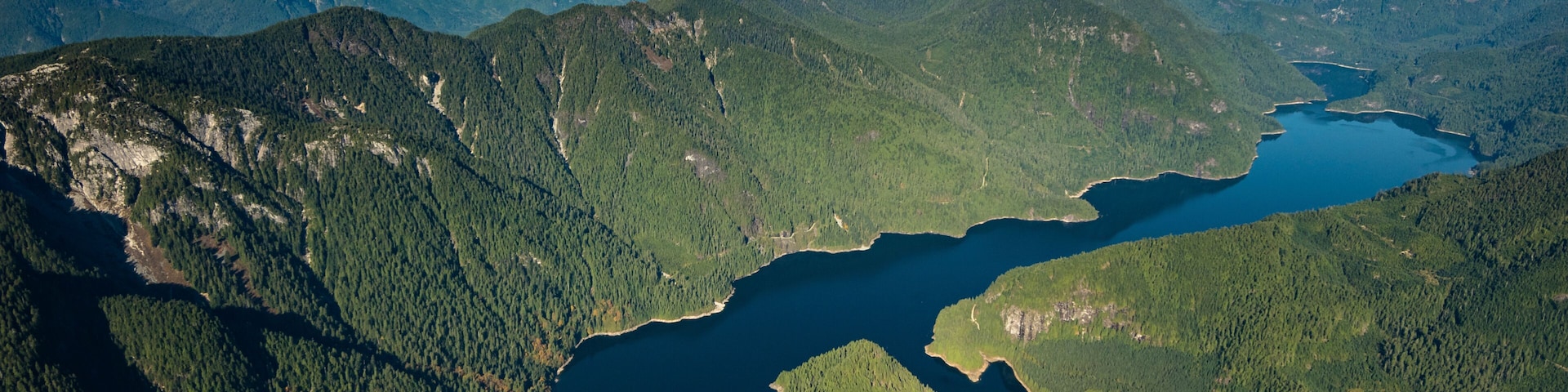 Stock aerial photo of the Coquitlam Lake Reservoir and mountains, Canada