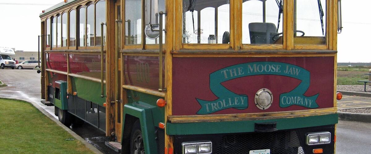 A vintage trolley with 'The Moose Jaw Trolley Company' written on the side.