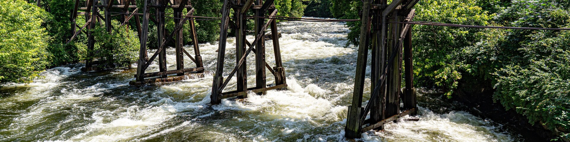 The wooden railroad bridge over the Winnipesaukee River in Franklin, New Hampshire