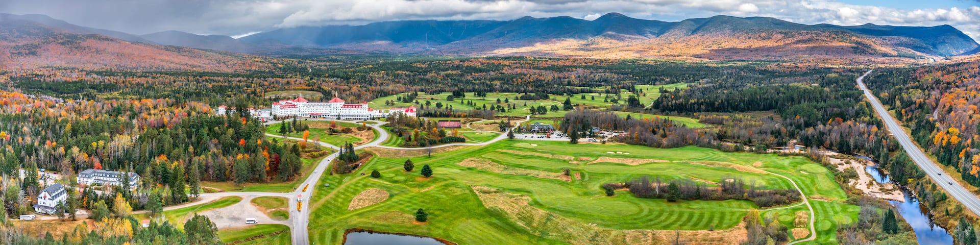 Aerial panorama of Presidential Range covered in clouds, in Bretton Woods, White Mountain National Forest, New Hampshire, along highway 302.