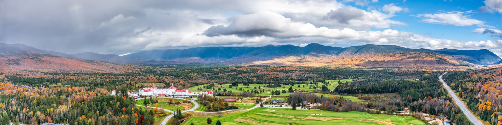 Aerial panorama of Presidential Range covered in clouds, in Bretton Woods, White Mountain National Forest, New Hampshire, along highway 302.