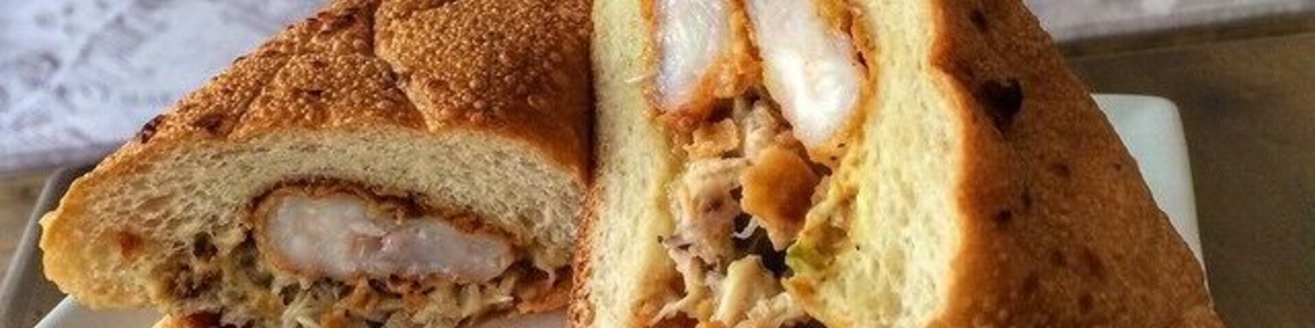 You know when you're driving your dogs back from the park after a hike in 95-degree heat amongst civil war ruins and you see this unassuming place in the corner of a strip mall and you HAVE to stop? Like it's an unarguable compulsion? Yeah. Don't ignore that. That's your deeper sense of instinct talking, and it knows what's up. And what's up is this drool-worthy shrimp 'n crab po' boy from the Skrimp Shack in Yorktown. There are two locations -- if you live anywhere in Hampton Roads (Coastal Virginia), this is very much worth a stop! Lobster rolls, po boys, hushpuppies, the works.