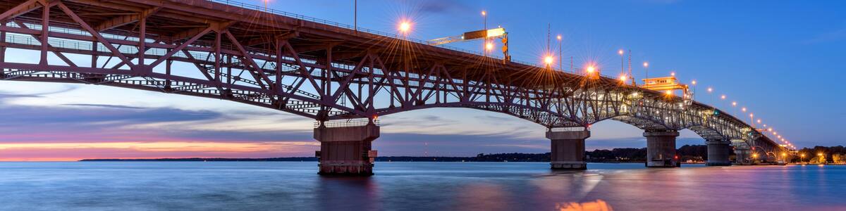 Coleman Bridge - A Summer sunset view of George P. Coleman Memorial Bridge, the largest double-swing-span bridge in U.S., crossing over York River at Yorktown, Virginia, USA.