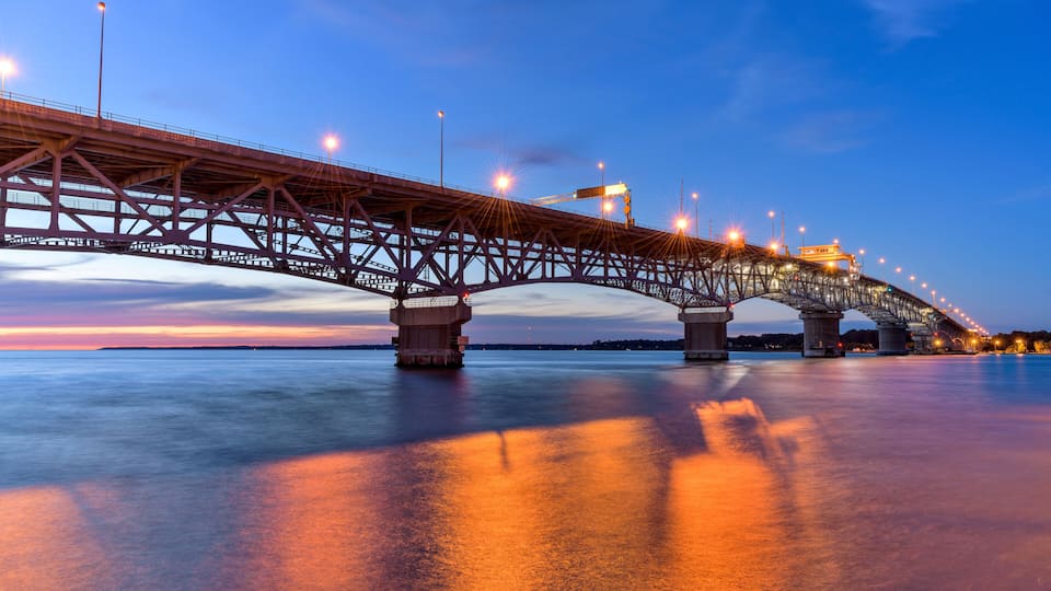 Coleman Bridge - A Summer sunset view of George P. Coleman Memorial Bridge, the largest double-swing-span bridge in U.S., crossing over York River at Yorktown, Virginia, USA.