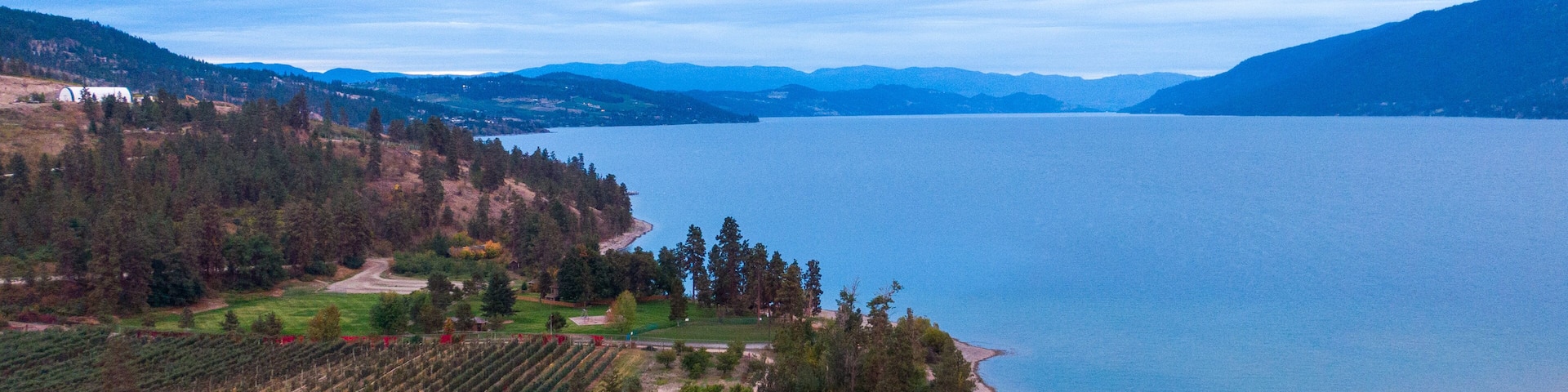 Vernon showing a small town or village, landscape views and a lake or waterhole