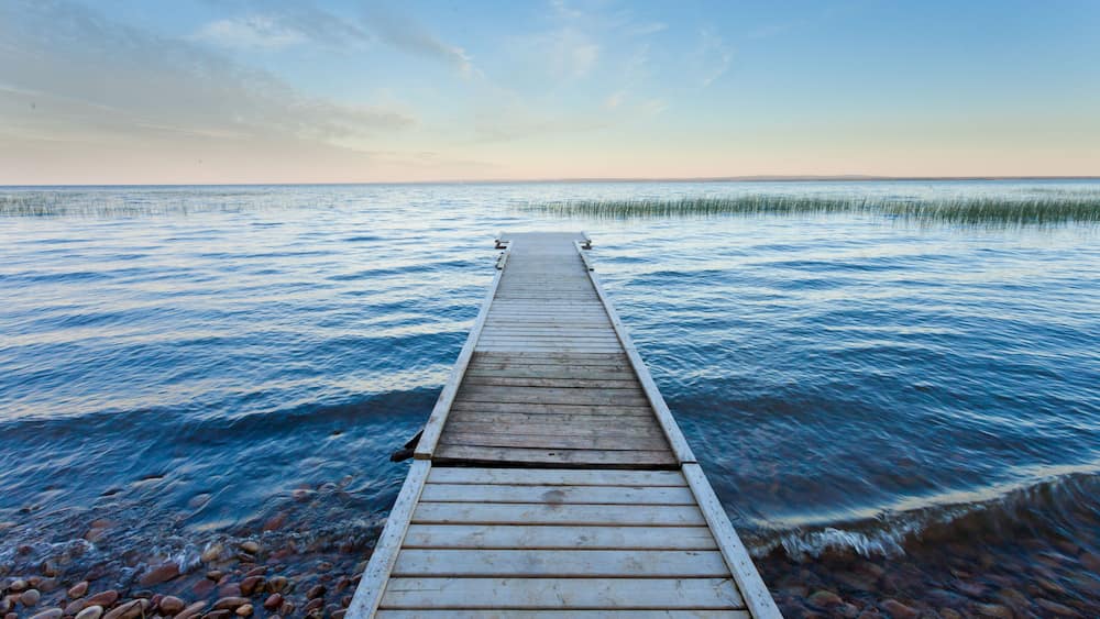 Lesser Slave Lake landscape with dock Alberta Canada