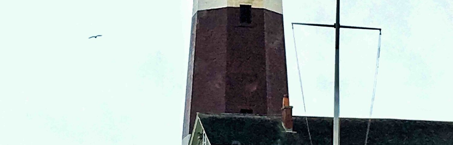 The Montauk Point Light is a lighthouse located adjacent to Montauk Point State Park, at the easternmost point of Long Island, in the hamlet of Montauk in the Town of East Hampton in Suffolk County, New York. The lighthouse was the first to be built within the state of New York, and was the first public works project of the new United States. It is the fourth oldest active lighthouse in the United States.