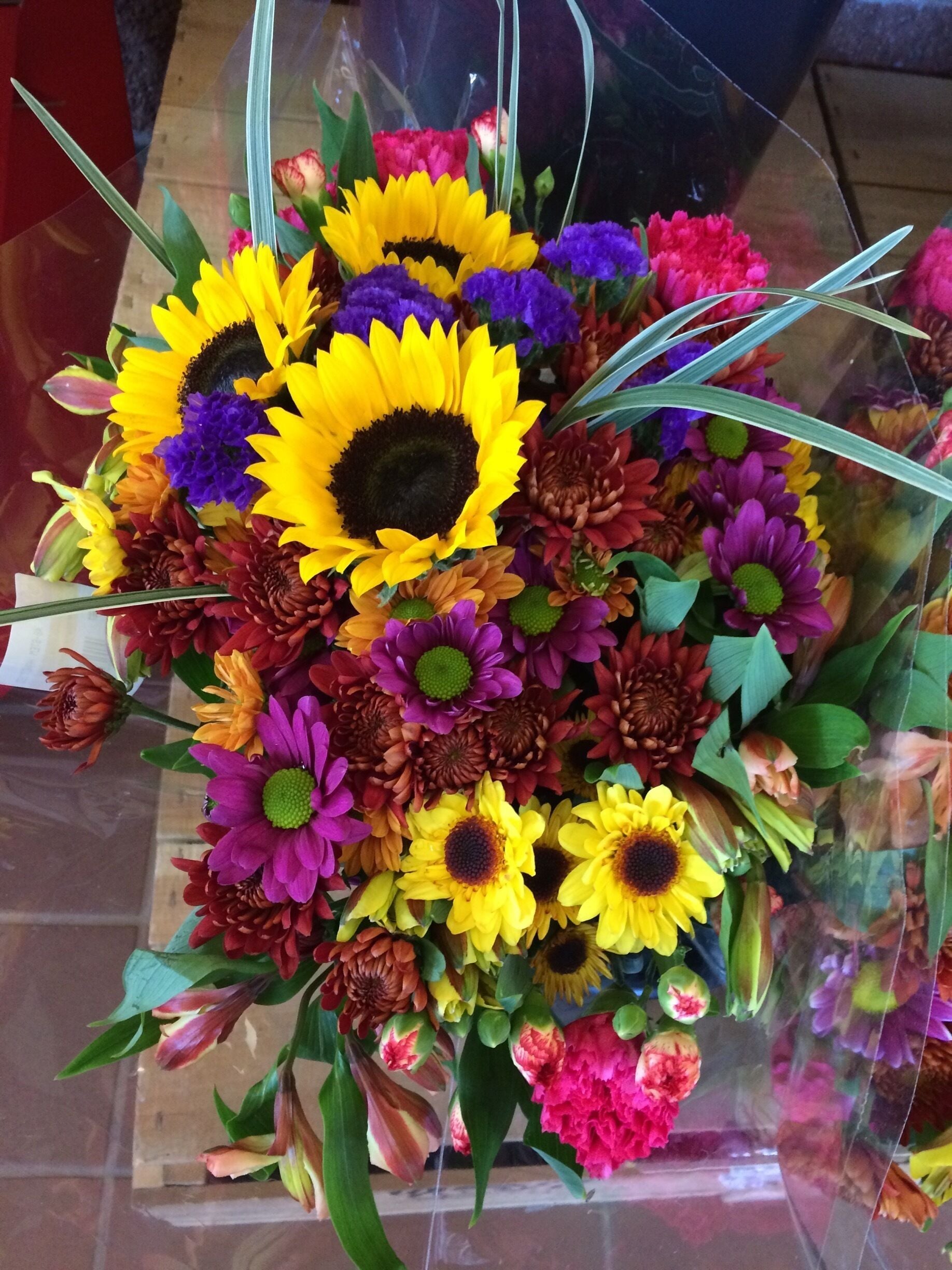 #colorful fall flowers at the local market.,