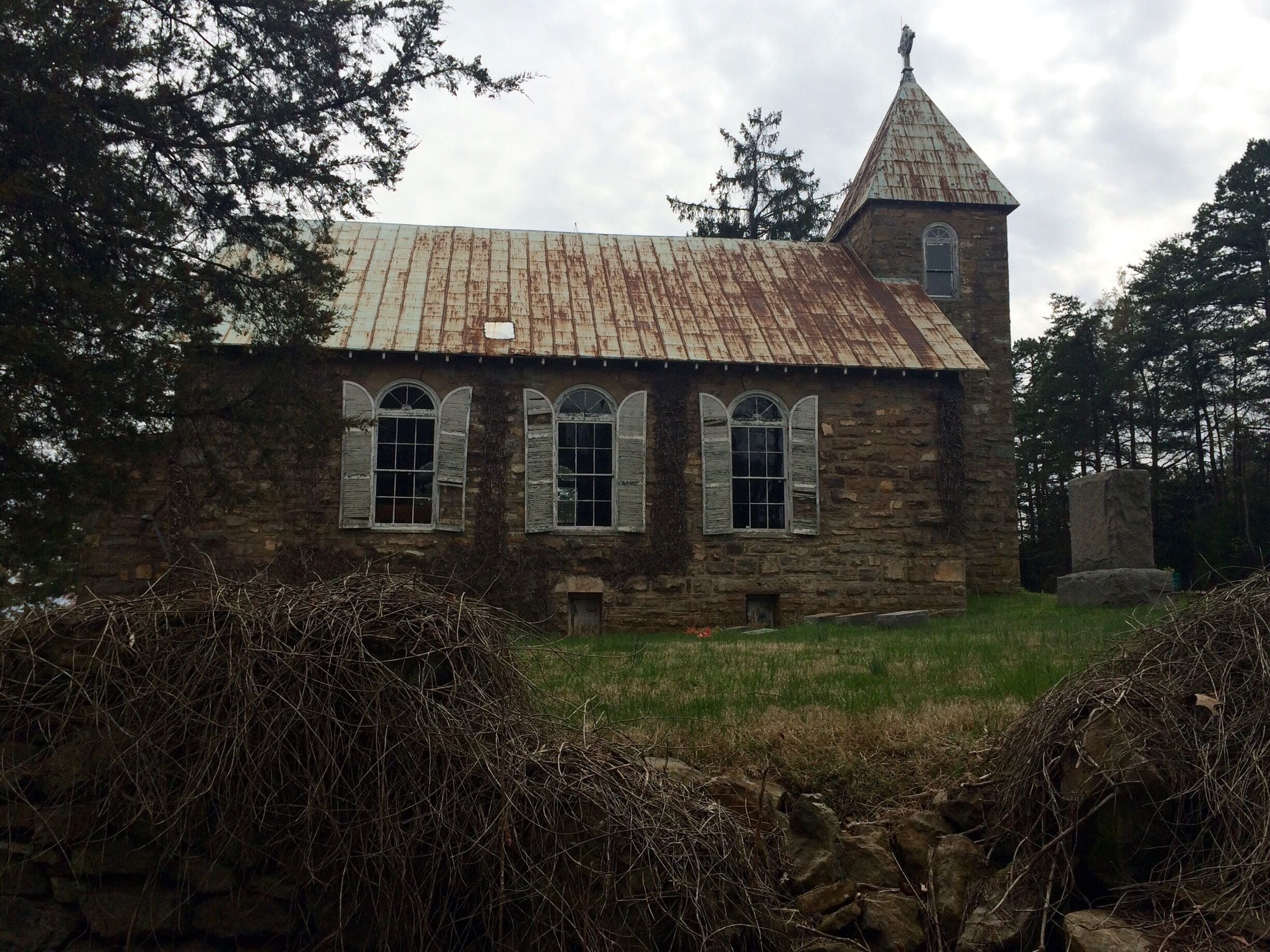 Found this abandoned church and graveyard driving along a county road in Virginia 