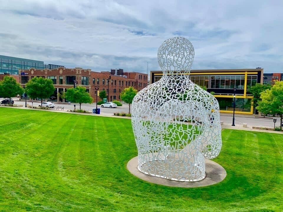 #adventure
“Nomade,” by the Spanish sculptor Jaume Plensa, a 27-foot-tall hollow human form made of a latticework of white steel letters, which looms over Locust Street, the one-way eastbound thoroughfare through Des Moines’s compact business district. The park is named for John and Mary Pappajohn, a Des Moines venture capitalist and his wife, who have given the 24 sculptures — valued at some $40 million — to the community through the Des Moines Art Center.
