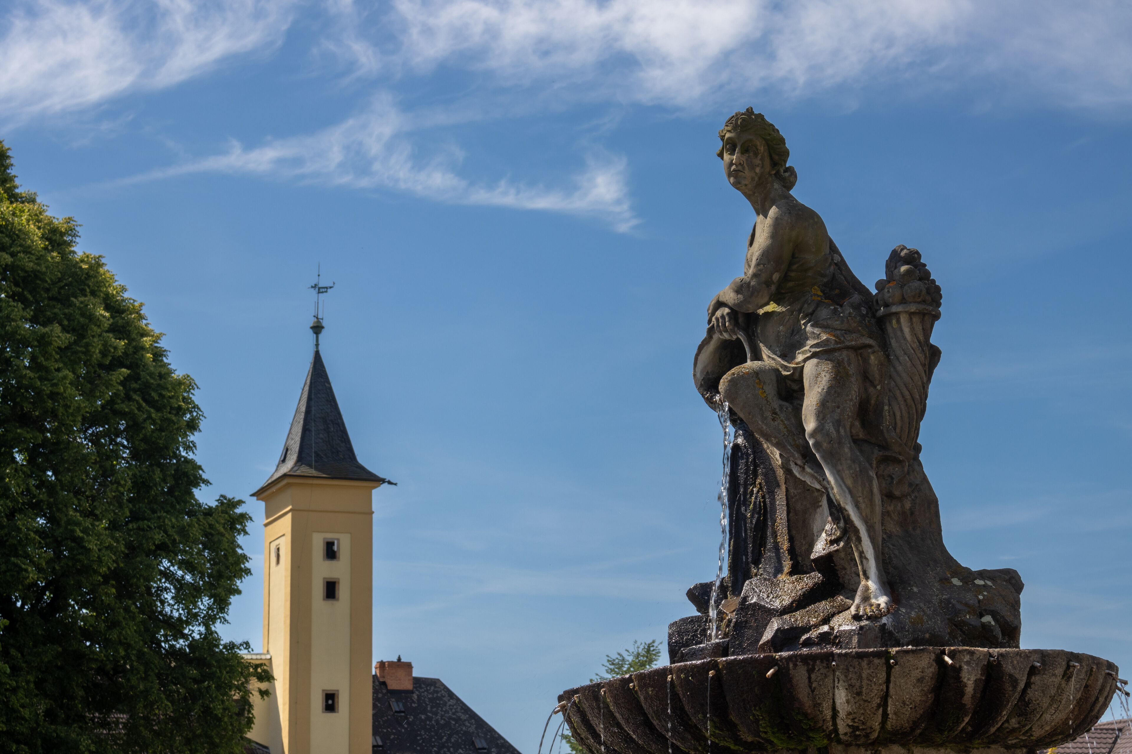 Fountain and castle tower, Zabreh, Czech republic