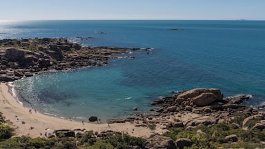 Horseshoe Bay is Bowen's most iconic beach and a favourite for locals and visitors alike. The beach is framed by two granite outcrops which provide a haven for a wonderful range of fish and coral just a short swim from the beach. There is also a little resort next to the car park. This is taken from Rotary Outlook which is about 10 min walk from the carpark.