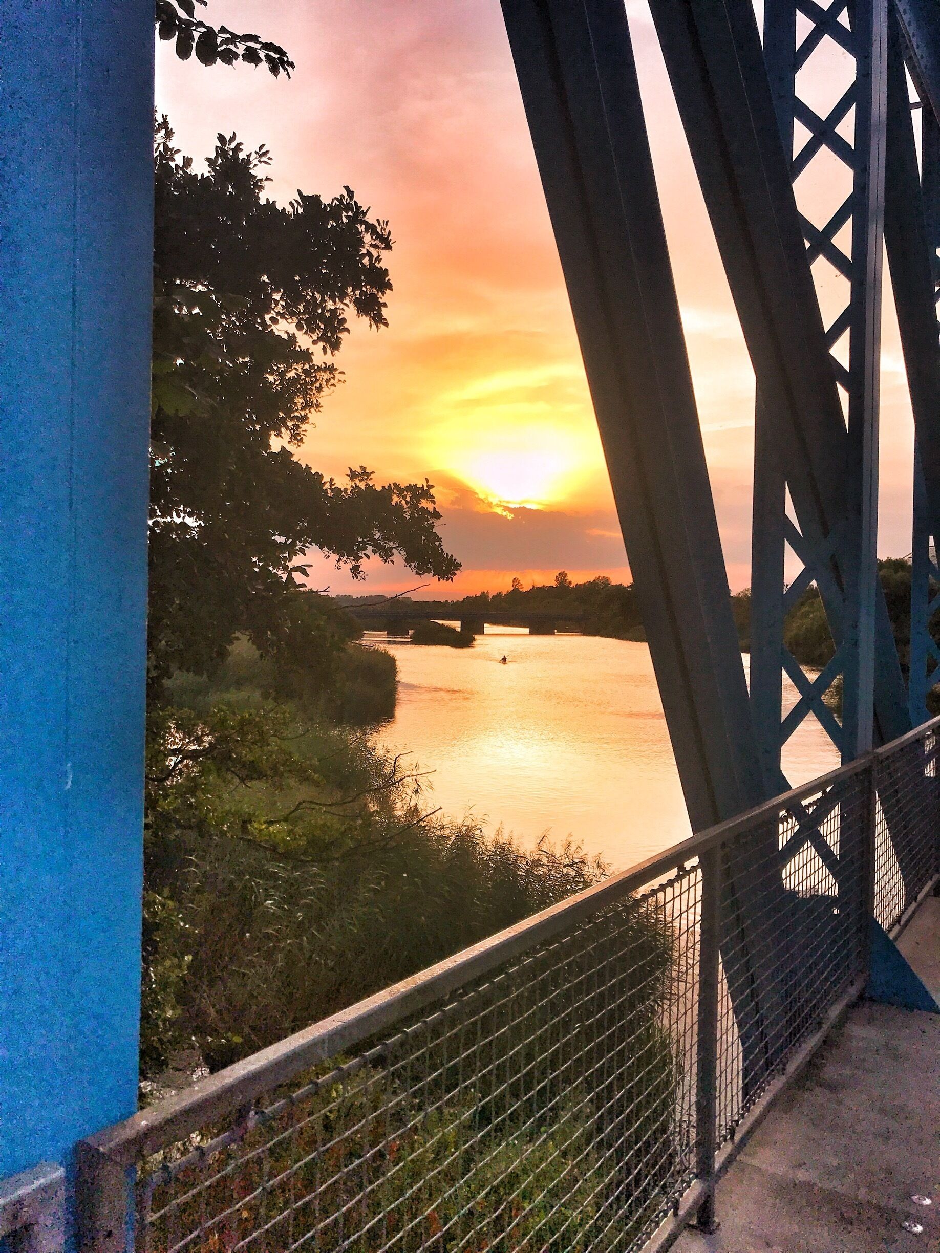 The blue bridge is built in 1900 as a railway bridge. It is now a footpath and painted in a lovely blue colour that shines beautifully in the golden hour