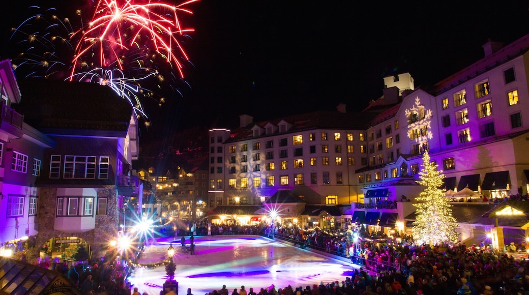 Beaver Creek featuring night scenes and performance art as well as a large group of people