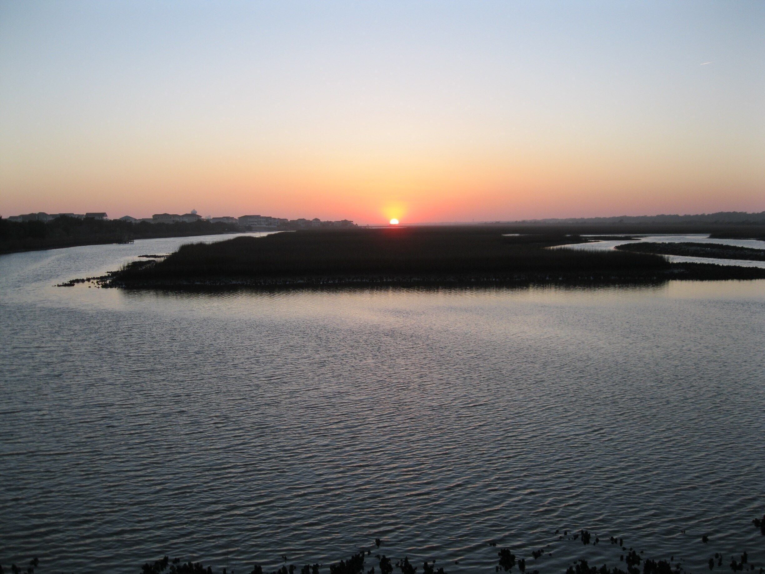 Sunset at high tide on the marsh at Ocean Isle.