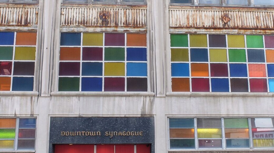 Patrons and staff of the Isaac Agree Memorial Soceity have joined together to revitalize the synagogue in downtown Detroit. This location marks the third home for the synagogue. It's impossible to miss with its colorful windows and bright red door welcoming its congregation.