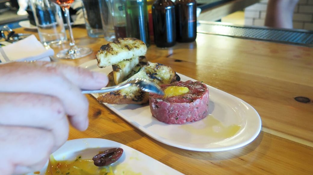 We almost skipped this Midtown restaurant after being turned away the night before but I am glad we went back and gave it a second try. This immensely popular eatery seems to always be packed so unless you make a reservation, go soon after they open to at least snag a seat at the bar. We shared the steak tartare and charred octopus with a glass of rose. Our waiter was great, the place is lovely with a laid back atmosphere