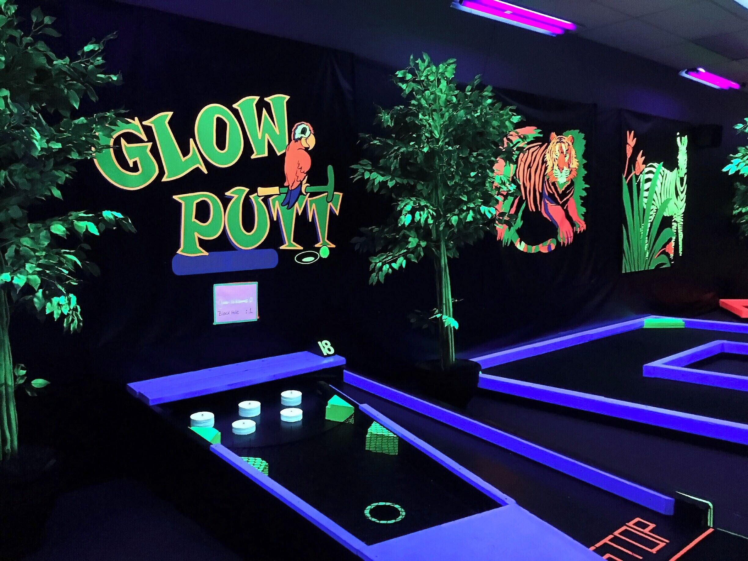 Great spot for a bit of family-friendly fun.  A full 18-hole mini golf that you play under blacklight!  Be sure dress your kids in some UV-reactive gear (at least something white).