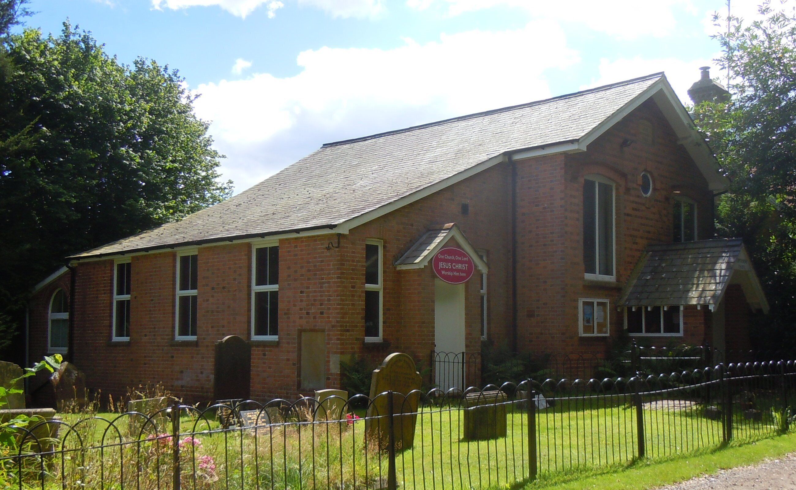 Copthorne Chapel, Chapel Lane, Copthorne, District of Mid Sussex, West Sussex, England. Built in 1828 and restored in 1898, according to the plaque above the circular window, this Countess of Huntingdon's Connexion evangelical chapel has been in continuous use ever since. It stands in an isolated position northeast of the village; the Surrey/West Sussex county boundary is immediately behind the photographer, and East Sussex and Kent are also close by.