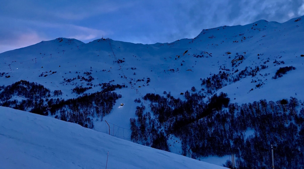 Ad dusk falls the piste bashers are hard at work
#Mountains Photo Challenge