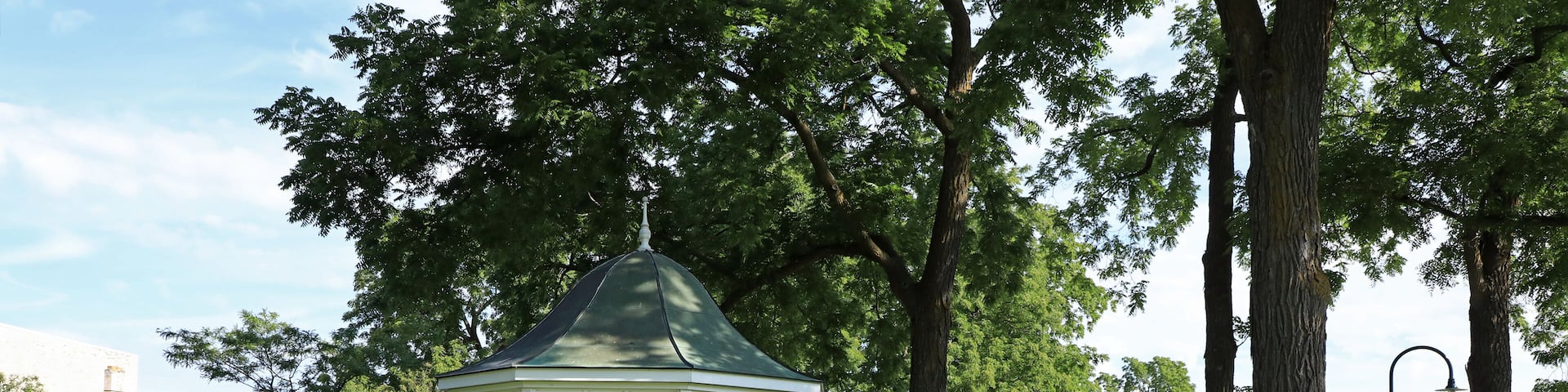 Gazebos are freestanding or attached to a garden wall, roofed, and open on all sides. They provide shade, shelter from rain and a place to rest, while acting as an ornamental feature.