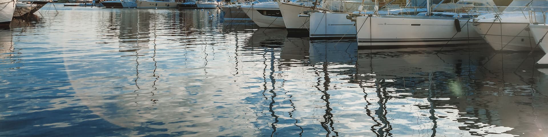 Colorful city on the water, Port of Grimaud, France, Provence, houses and boats. Beautiful city landscape; Shutterstock ID 1084314431; purchase_order: SP-1332 HA Batch 2 August 2018; Order: ; client: