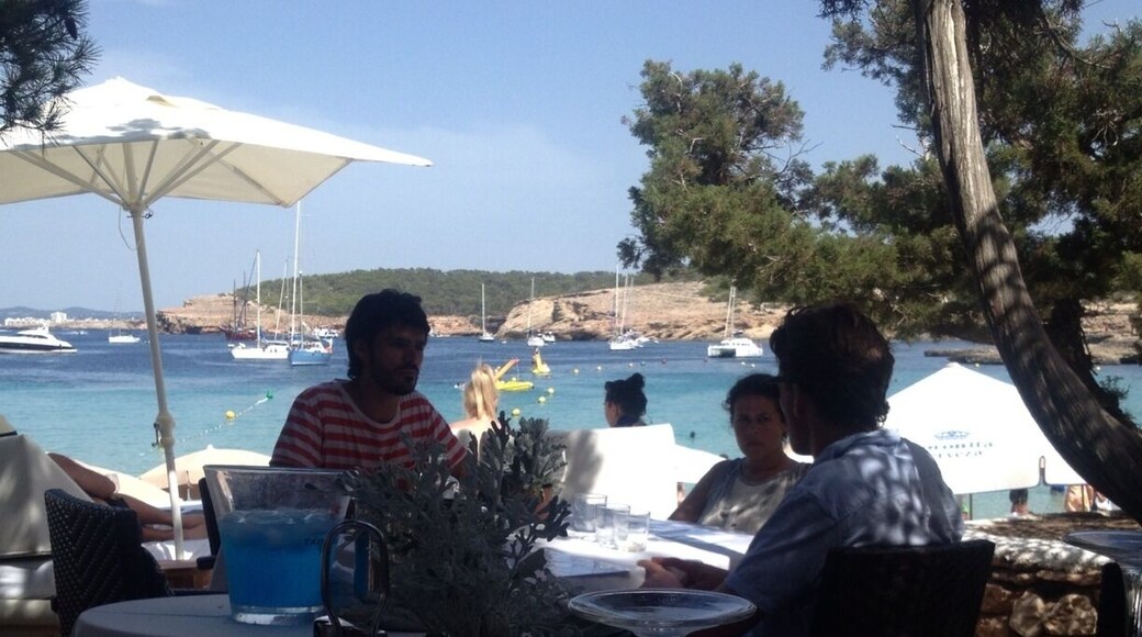 A friend suggested this beach and although it is packed, the setting is perfect. Great beach restaurants, swimming, and people watching. Very Ibiza...in its own way.