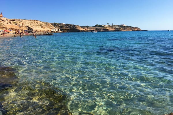 We took a cab to get the other side of the island for a more serene environment and turquoise waters. There are different parts of the beach to chill at. My friend got a mild sting from a tiny dying jellyfish that was washing ashore, but the lifeguard station was helpful.
Be sure to make reservations at Sunset Ashram for awesome sunset views. Understandably, the businesses there won't let you use their phone to call a taxi, so be prepared! All in all, it was the highlight of my visit to these islands and I highly recommend this beach.