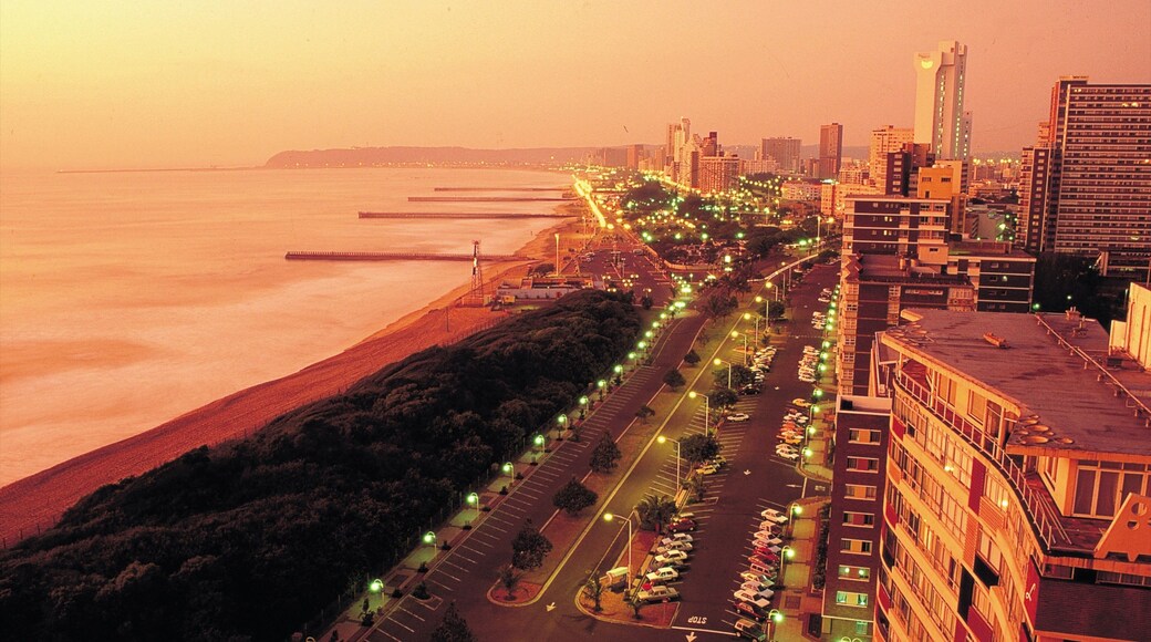 Durban showing a city, a high rise building and general coastal views