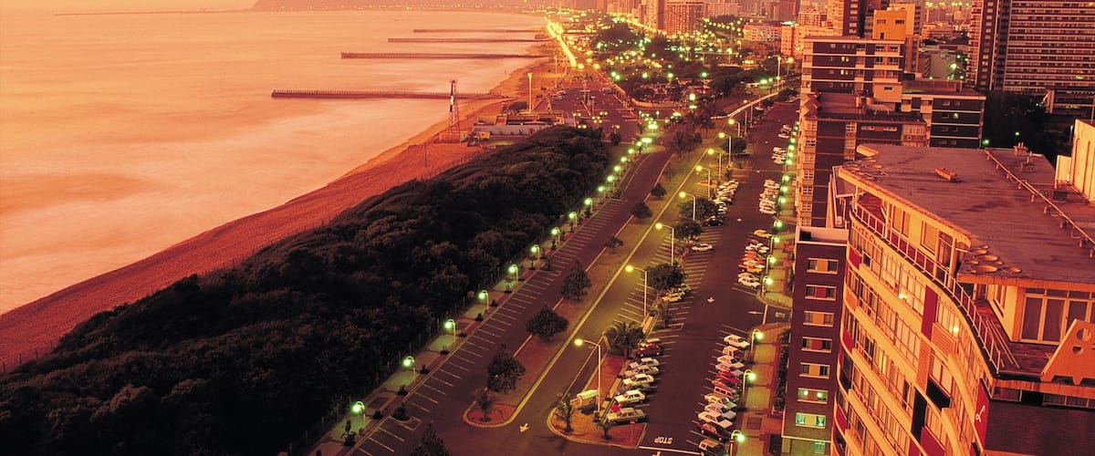 Durban showing a city, a high rise building and general coastal views