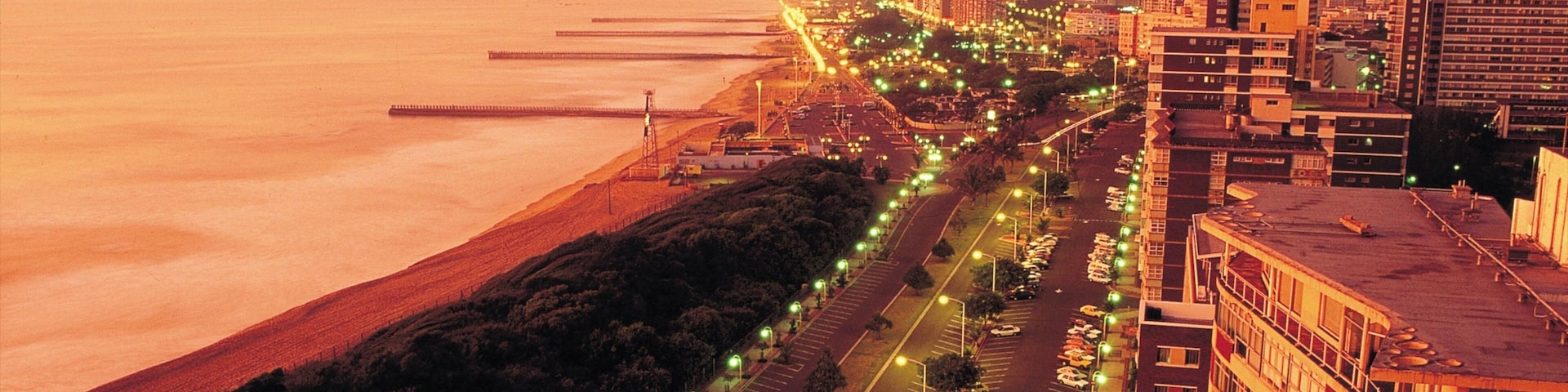 Durban showing a city, a high rise building and general coastal views