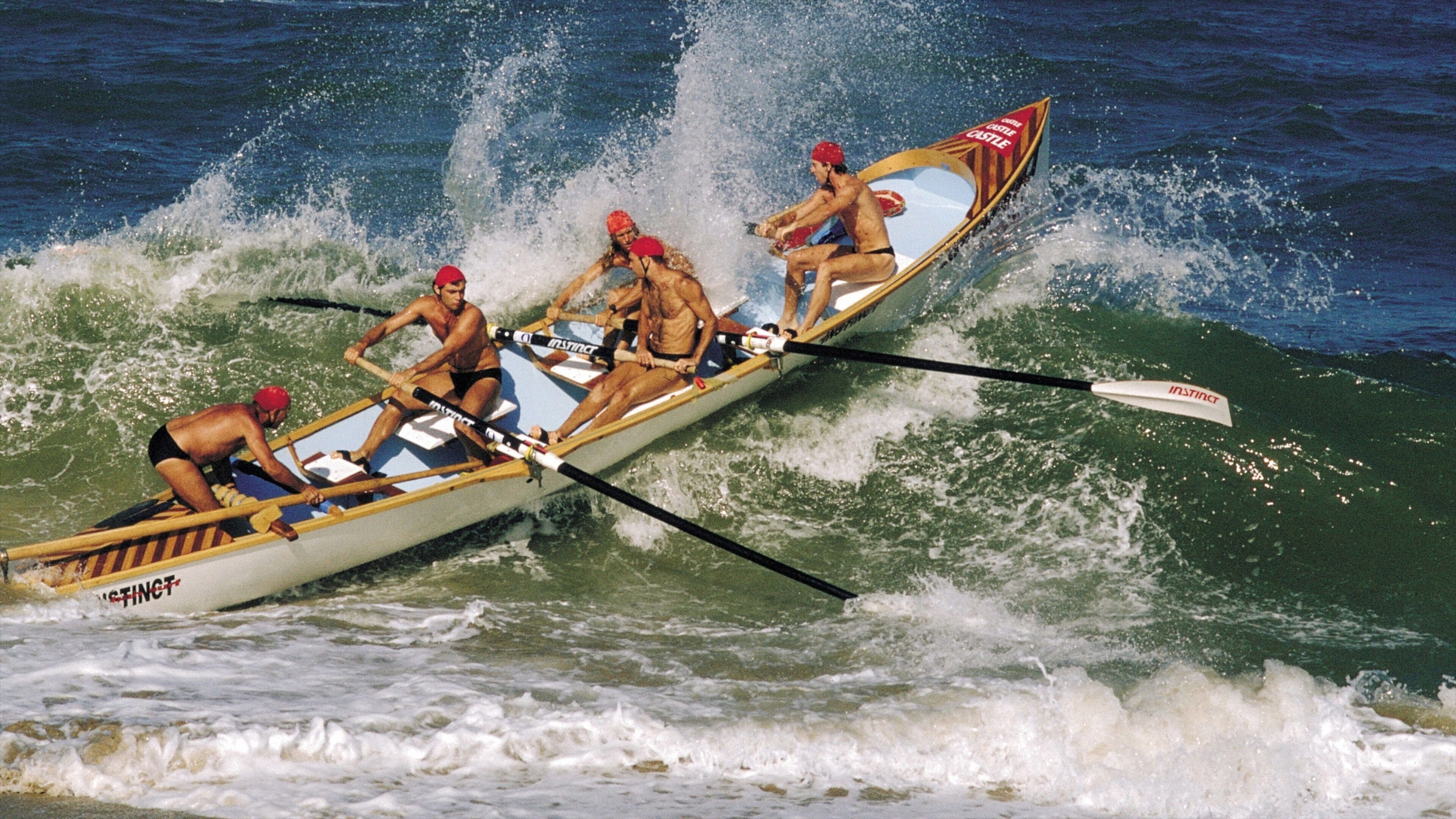Durban mostrando vistas generales de la costa, surf y un evento deportivo