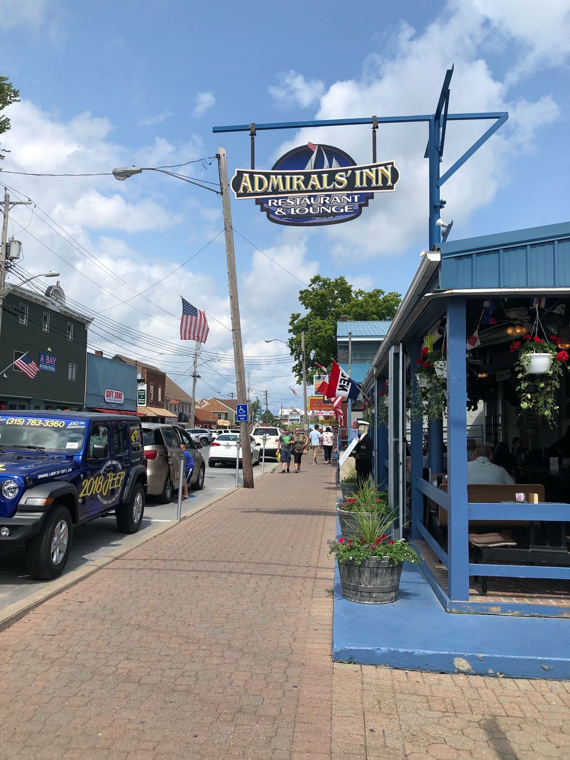 Darling town in the 1000 lake region of New York which has a bit of a Key West Florida feel.