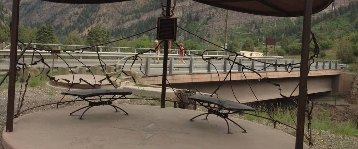 This is an artistic memorial to Sue and Karen, who perished while ice climbing in Alaska, dedicated by their family and friends. It is situated at the base of the Ouray Ice Park, a premier climbing locale situated in dynamic Box Canyon and along the Ouray Perimeter Trail which is an excellent 5-hour round trip hike.