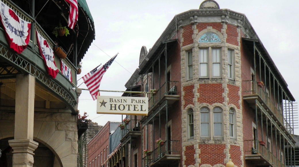 Eureka Springs featuring signage and heritage architecture