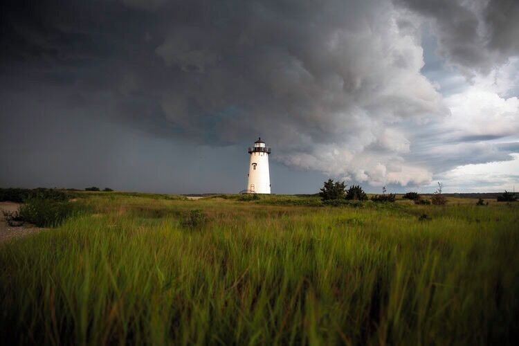 A thunder storm lurks over the island, clouds swirled with dark grey and shot down rain. A single light stood in the distance, a storm maker orchestrated his art. #adventure