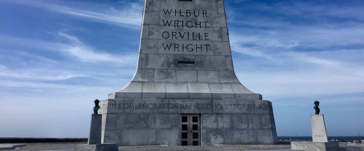 Wright Brothers National Memorial, located in Kill Devil Hills, North Carolina, commemorates the first successful, sustained, powered flights in a heavier-than-air machine. From 1900 to 1903, Wilbur and Orville Wright came here from Dayton, Ohio, based on information from the U.S. Weather Bureau about the area's steady winds. On my recent visit, those strong, steady winds were still blowing!!