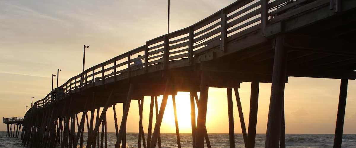 Morning walk on the beach in the Outer Banks.  Caught the sun rising at the Avalon Pier.