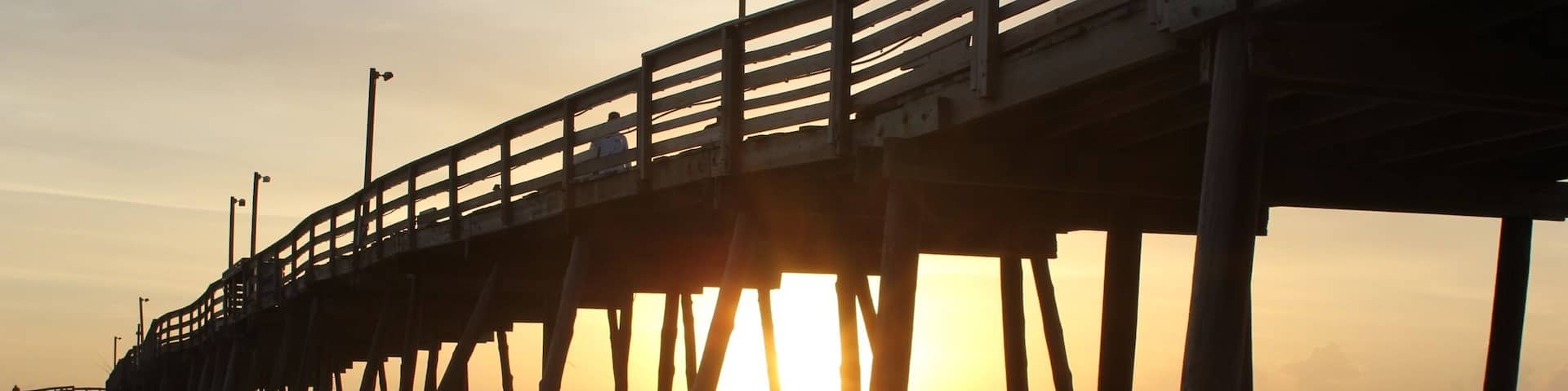 Morning walk on the beach in the Outer Banks. Caught the sun rising at the Avalon Pier.