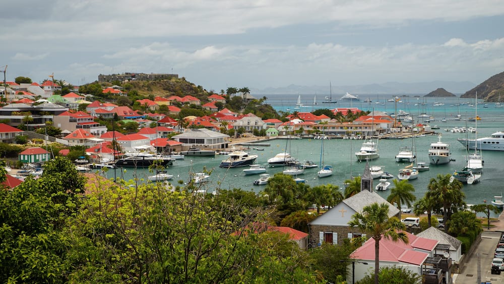Gustavia featuring a bay or harbor, a coastal town and general coastal views