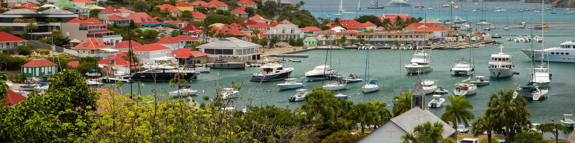 Gustavia featuring a bay or harbor, a coastal town and general coastal views