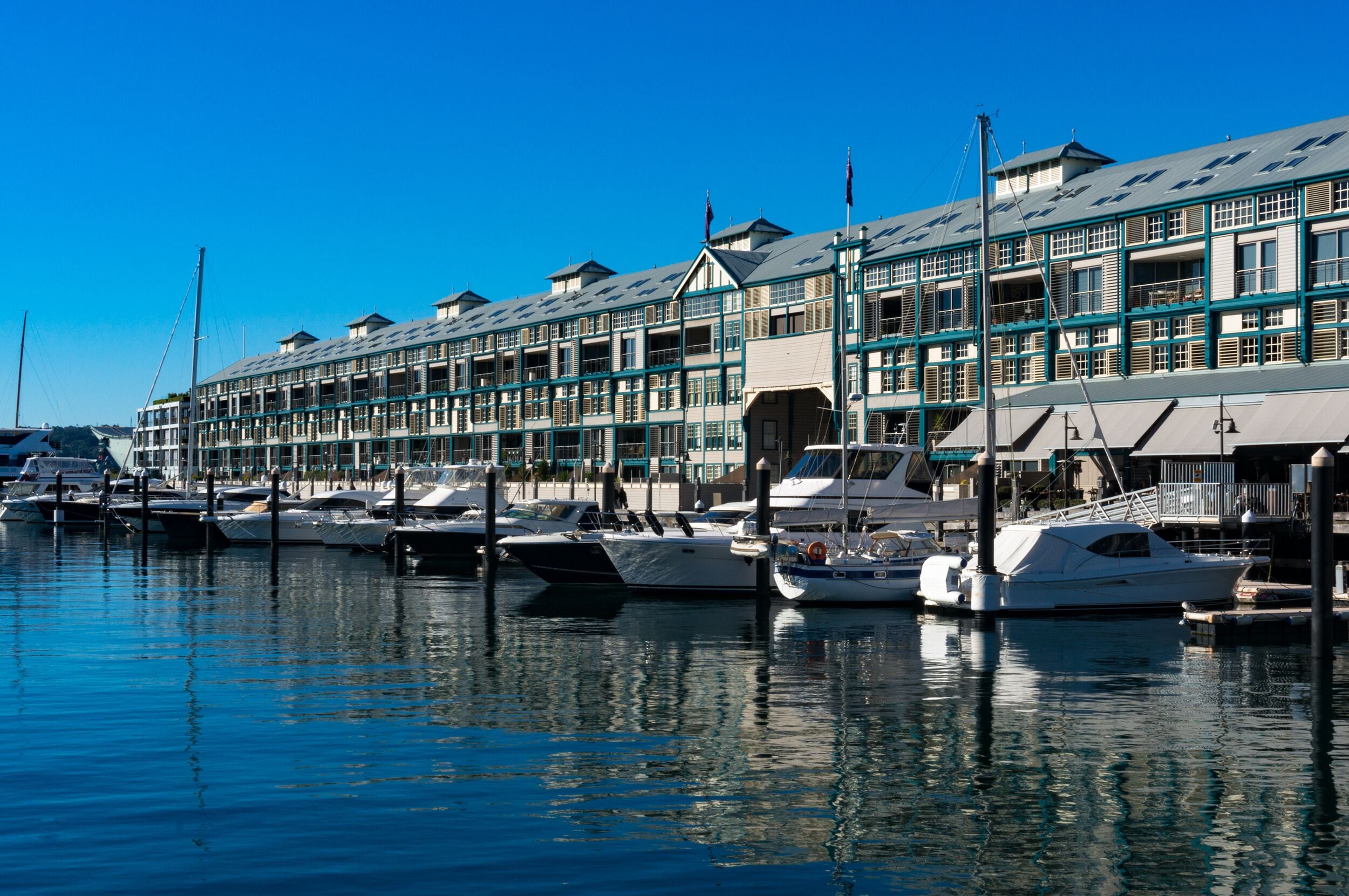 Woolloomooloo bay with historic Finger wharf which is the longest timbered-piled wharf in the world. Sydney, Australia; Shutterstock ID 449510257