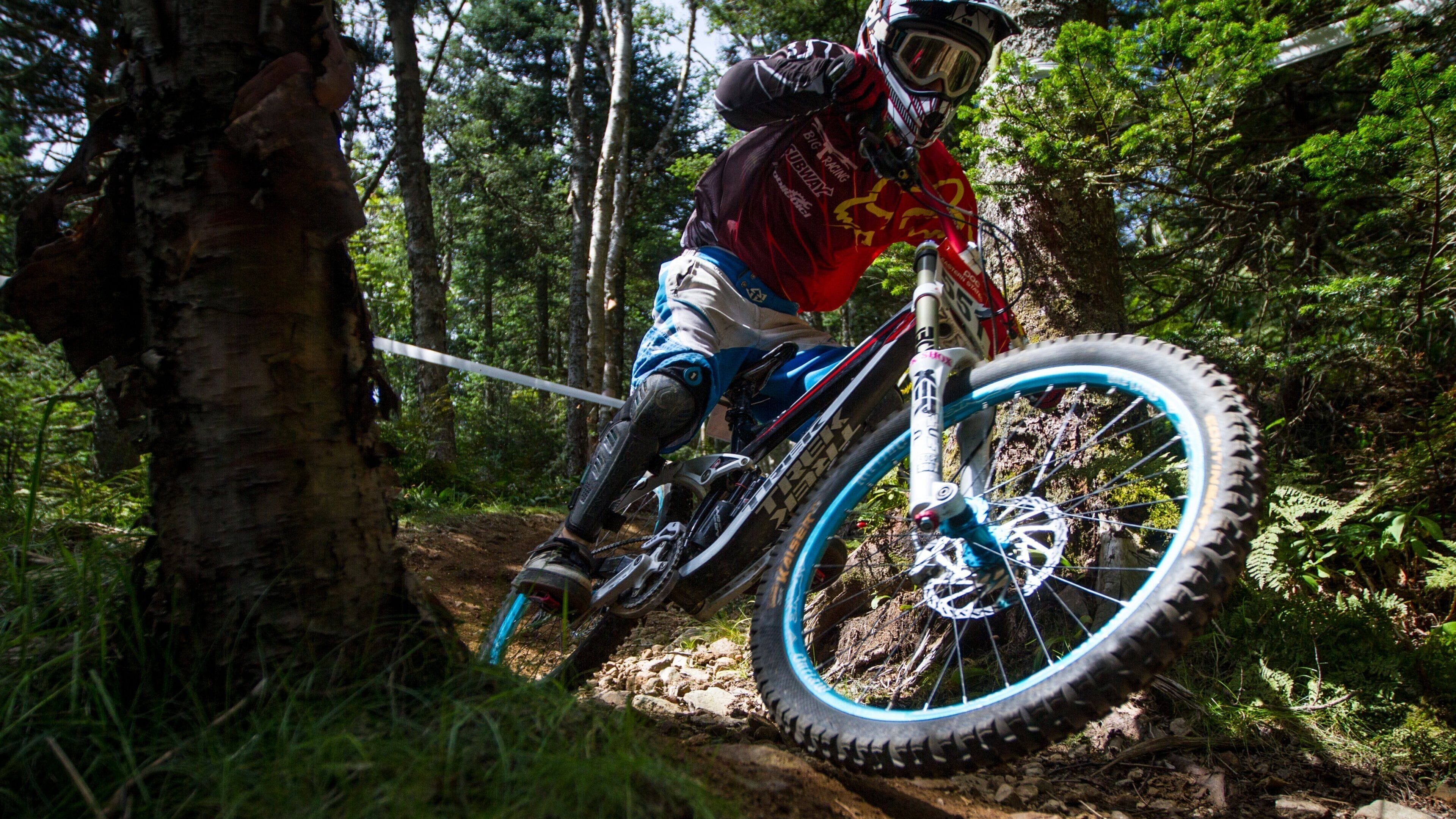 Killington which includes forest scenes and mountain biking as well as an individual male