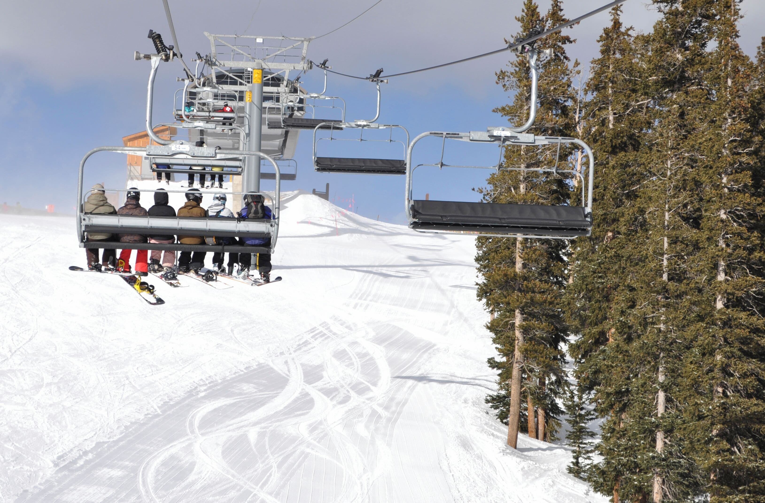 Skiiers and Snowboarders Riding Up a Ski Lift, Keystone, Colorado